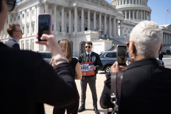 Connor Spence, the first union organizer in his family, is now the president of the Amazon Labor Union (ALU), the only Amazon union in the United States. Although the union was officially recognized four years ago, negotiations have never taken place since then. By refusing to negotiate or even recognize the ALU, Amazon “has engaged in unfair labor practices,” according to the NLRB (National Labor Relations Board).