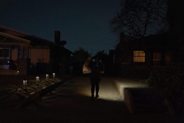 Ending the day by flashlight after 250 stops, she delivery 400 packages in 8 hours.